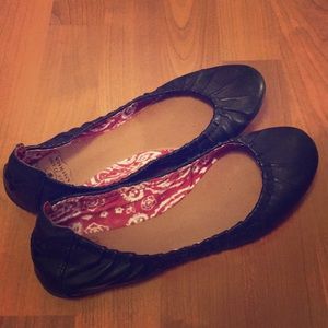 Black leather flats